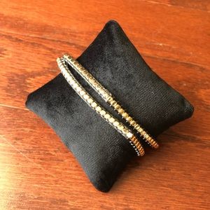 New in box gold/black bracelet